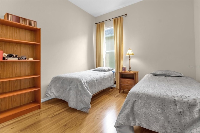 bedroom featuring light wood-type flooring