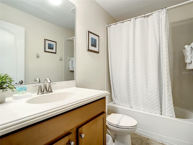 full bathroom featuring a textured ceiling, vanity, toilet, and shower / bath combo with shower curtain