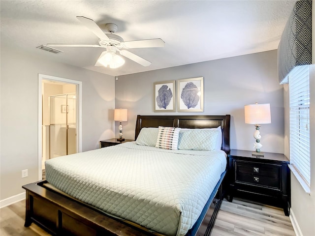 bedroom with light hardwood / wood-style flooring and ceiling fan