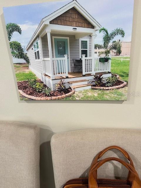 view of front of home featuring covered porch