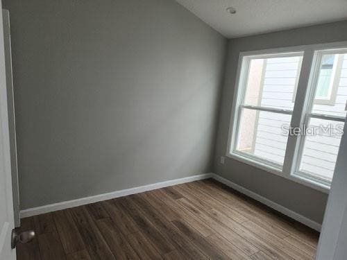 575 2nd St, Oviedo, FL 32765 - spare room featuring wood-type flooring