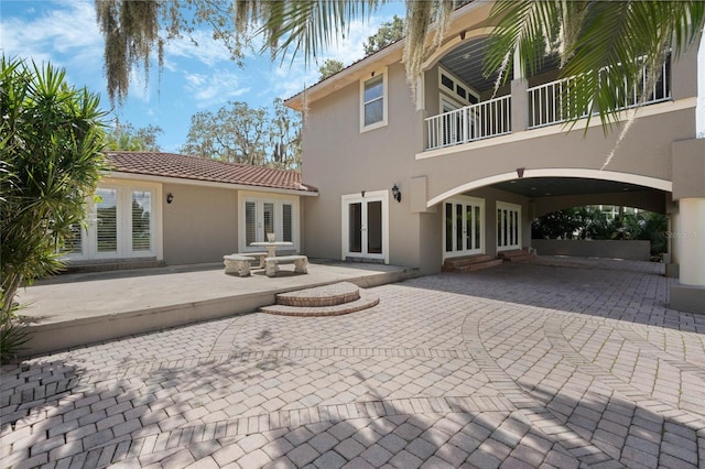 exterior space featuring french doors and a patio area