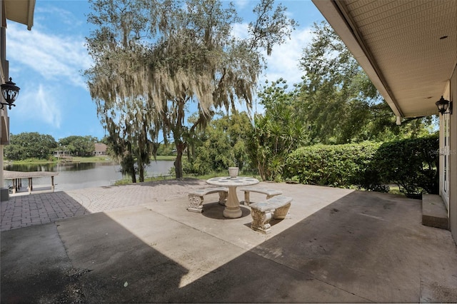 view of patio / terrace featuring a water view