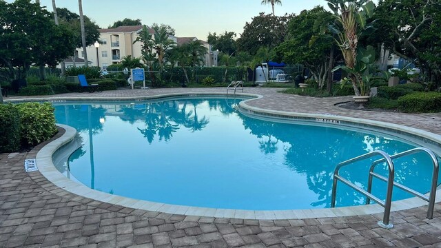 community pool with fence