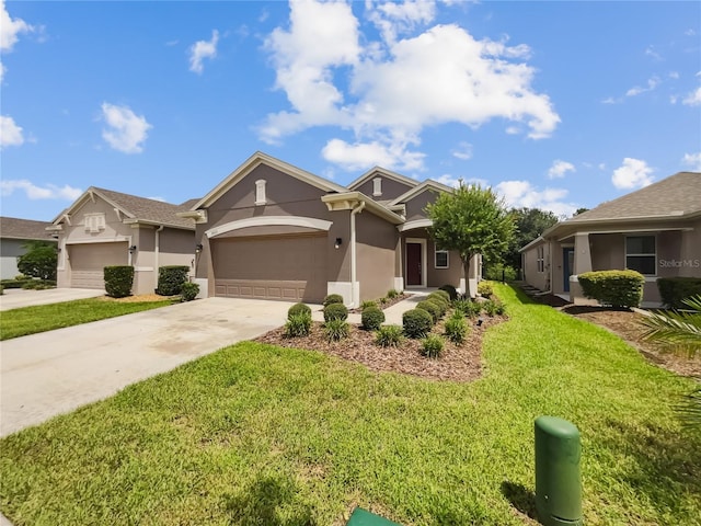 view of front of house featuring a garage and a front lawn