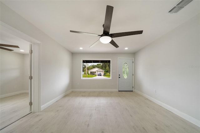 entrance foyer with visible vents, ceiling fan, baseboards, recessed lighting, and light wood-style floors