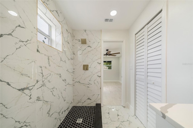 bathroom with a marble finish shower, marble finish floor, a closet, and visible vents