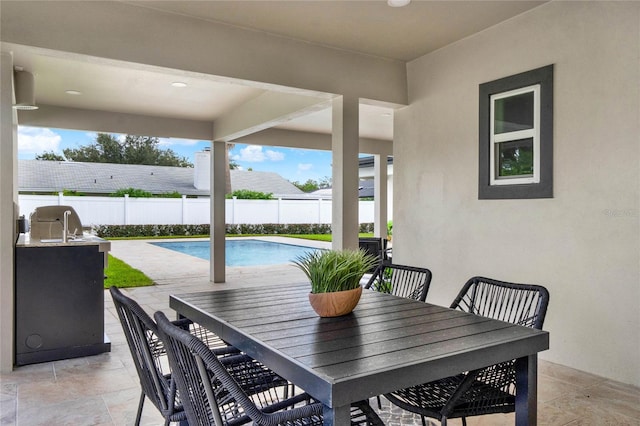 view of patio / terrace featuring a fenced in pool