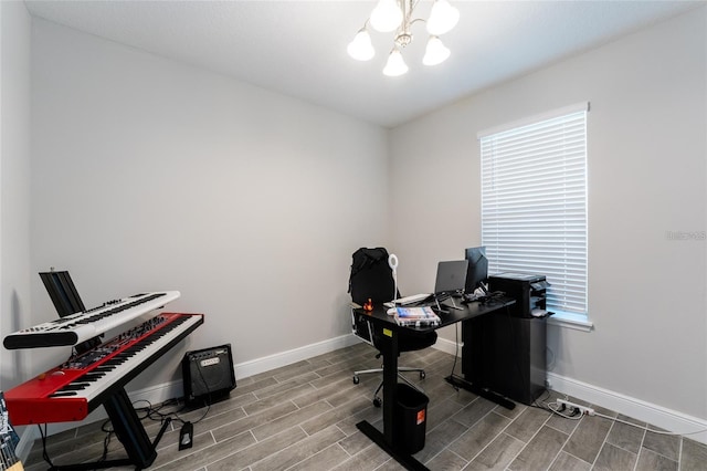 office featuring a notable chandelier