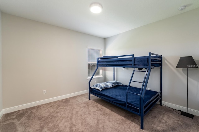 bedroom featuring carpet