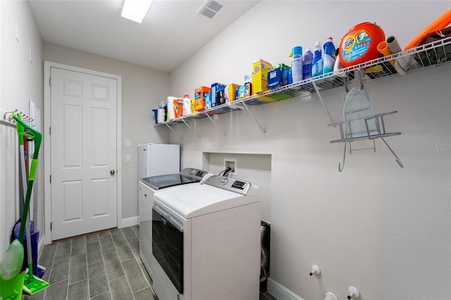 laundry room featuring washer and dryer