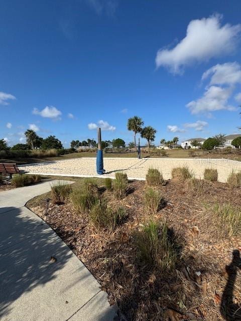 view of yard featuring volleyball court