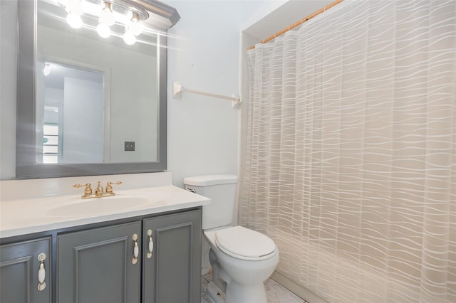 bathroom with a shower with shower curtain, toilet, and vanity