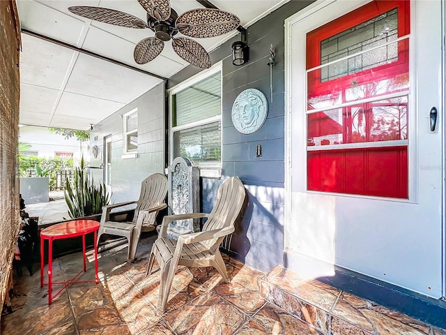 view of patio with ceiling fan and covered porch