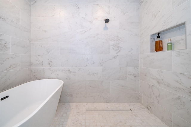 bathroom featuring a washtub