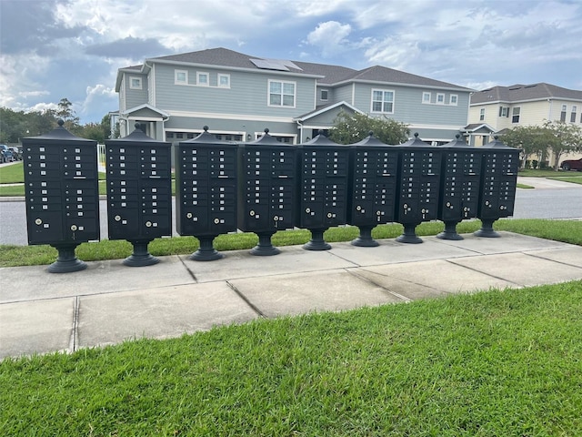 view of property's community featuring mail boxes