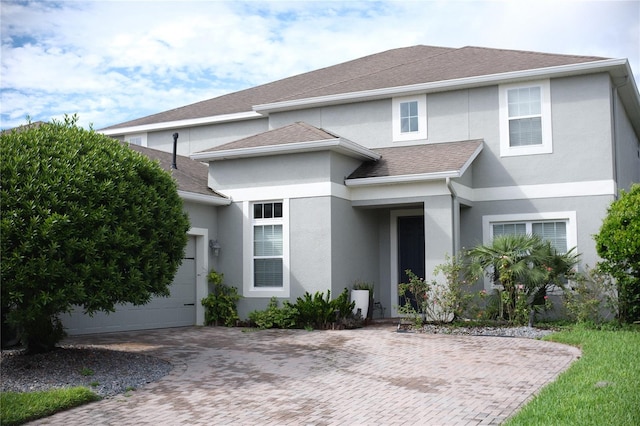 view of front of home with a garage