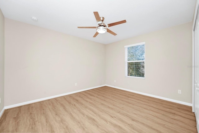 unfurnished room featuring ceiling fan and light hardwood / wood-style floors