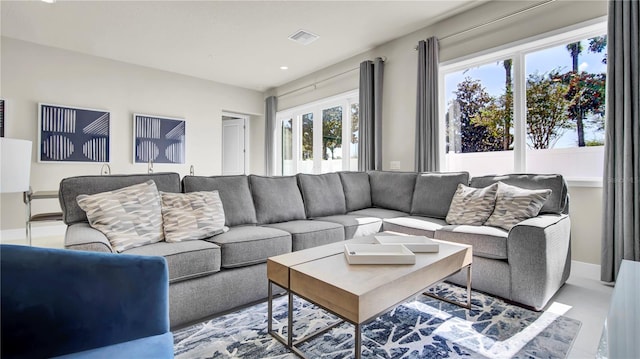 tiled living room with french doors