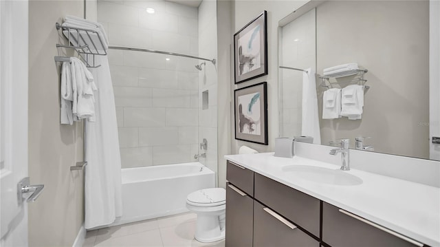 full bathroom with shower / tub combo, vanity, toilet, and tile patterned floors