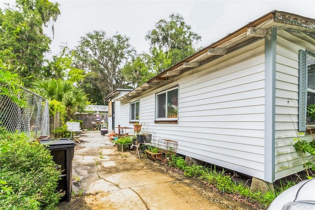 view of side of home featuring a patio