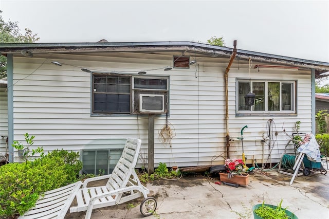 rear view of house featuring a patio