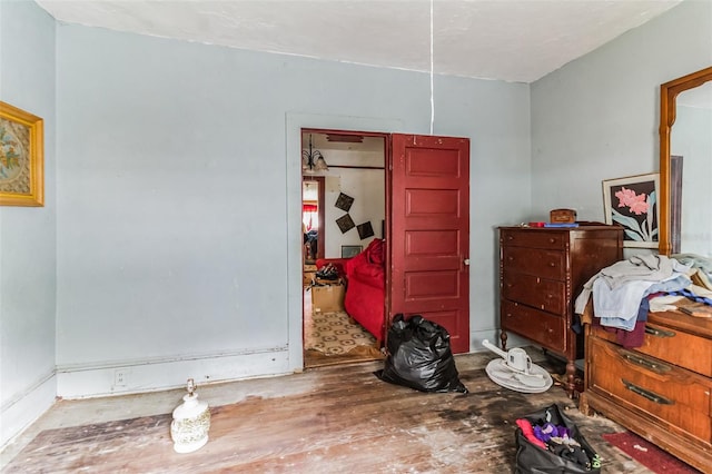 bedroom featuring hardwood / wood-style floors