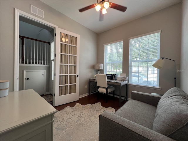 office with ceiling fan and dark hardwood / wood-style floors