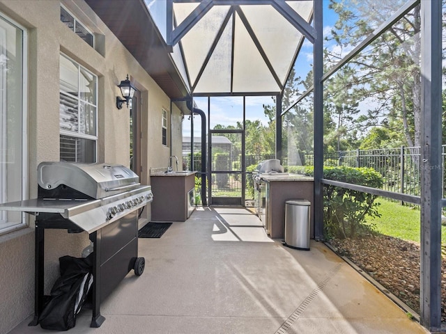 sunroom / solarium featuring sink