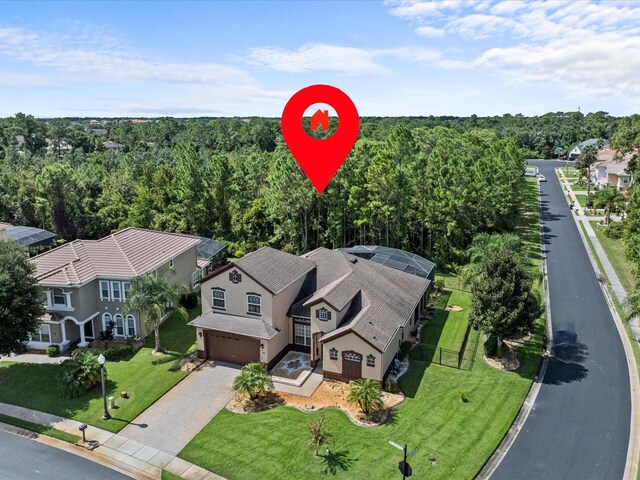 aerial view with a wooded view