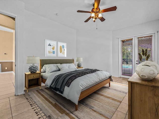 bedroom featuring light tile patterned floors, access to outside, ceiling fan, and visible vents