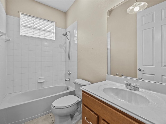 full bathroom featuring toilet, vanity, shower / washtub combination, and tile patterned floors