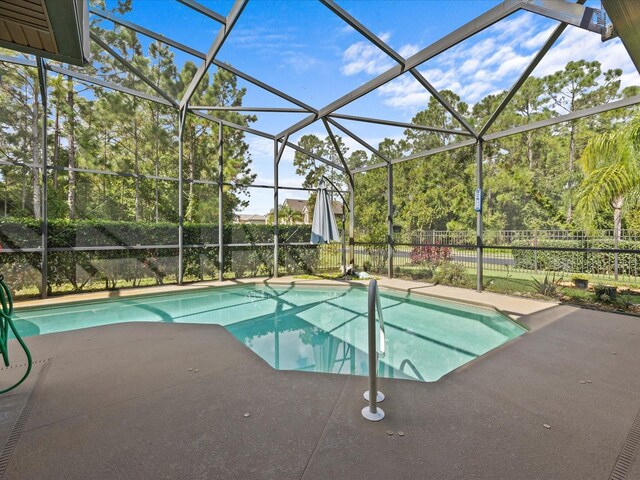 view of pool with a fenced backyard, a patio area, a lanai, and a fenced in pool