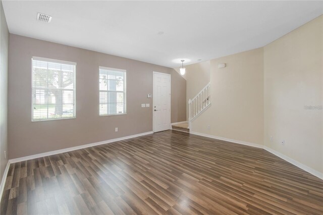 interior space with dark hardwood / wood-style flooring