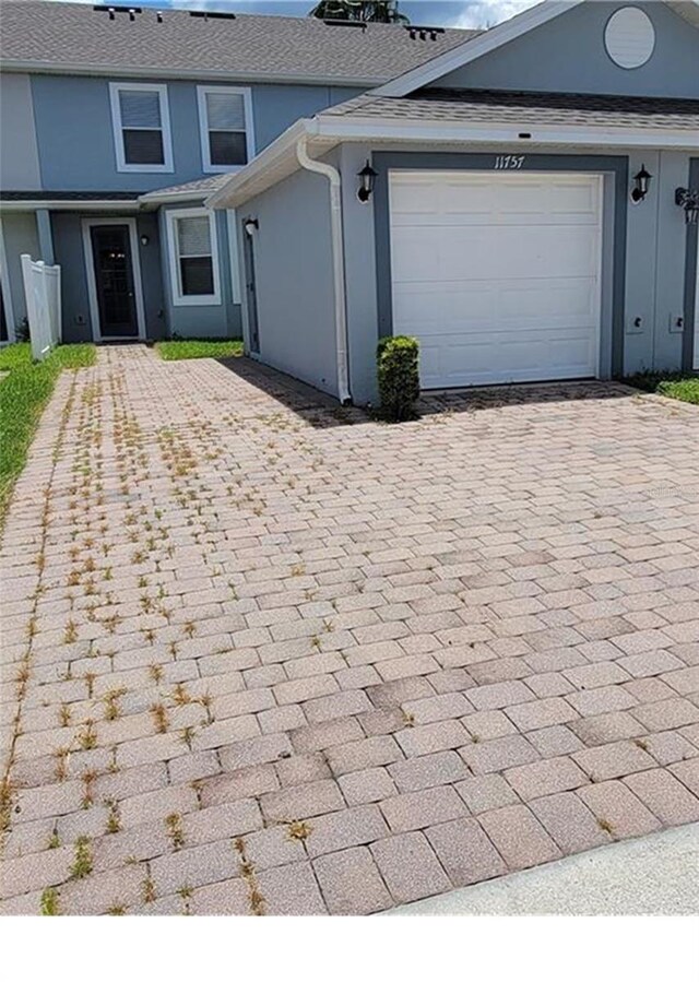 front of property featuring a garage