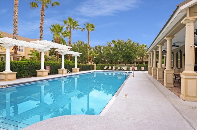 view of swimming pool with a pergola and a patio area