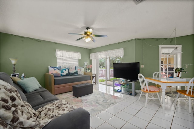 2101 Appy Ln, Apopka, FL 32712 - living area with a ceiling fan and light tile patterned floors
