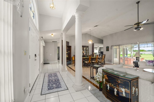 2101 Appy Ln, Apopka, FL 32712 - tiled entrance foyer with decorative columns, a ceiling fan, and high vaulted ceiling