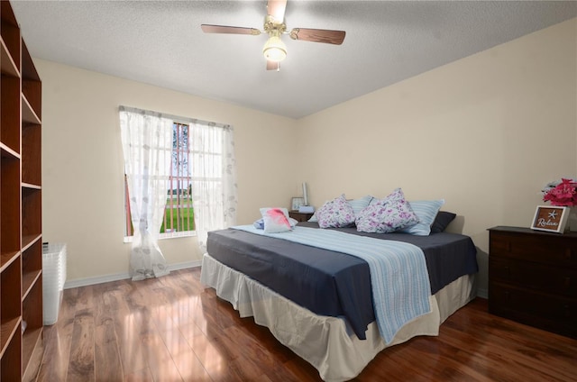 2101 Appy Ln, Apopka, FL 32712 - bedroom featuring wood finished floors, a ceiling fan, and a textured ceiling