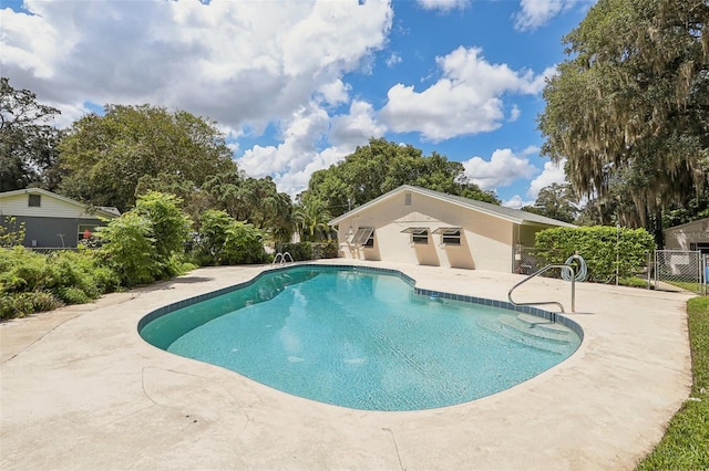 view of pool featuring a patio area