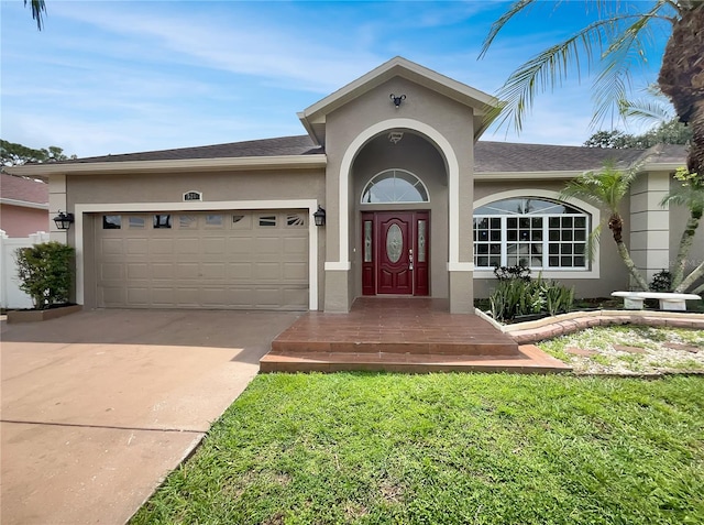 exterior space featuring a yard and a garage