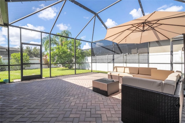 view of patio featuring outdoor lounge area and a lanai