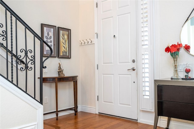 entrance foyer with hardwood / wood-style floors