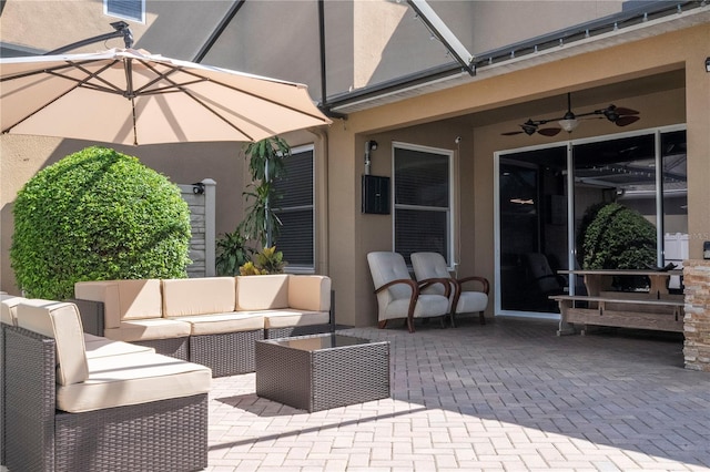 view of patio with an outdoor hangout area and ceiling fan