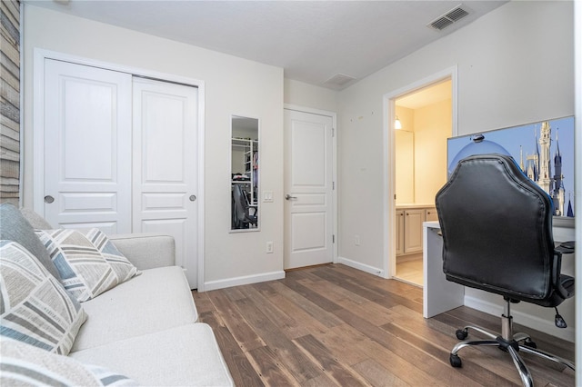 office area with dark wood-type flooring