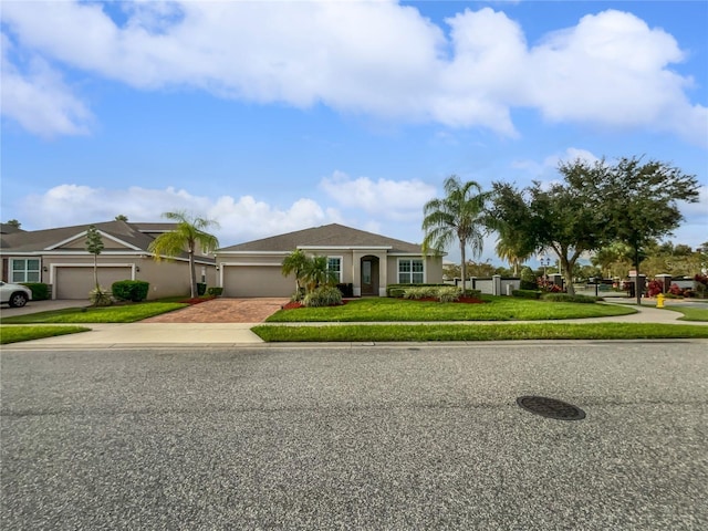 single story home featuring a garage