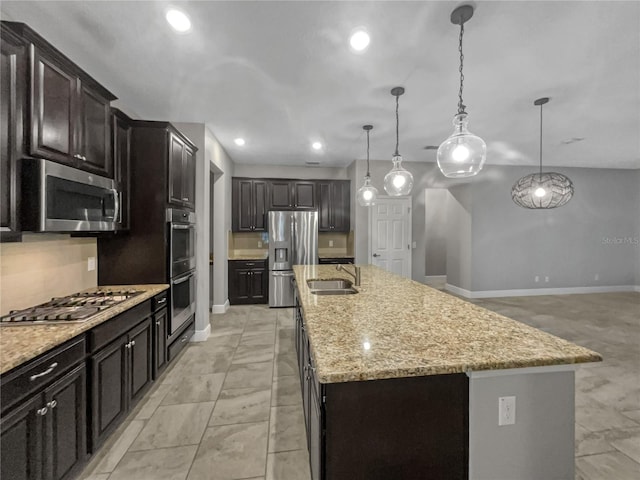 kitchen featuring pendant lighting, a spacious island, and stainless steel appliances