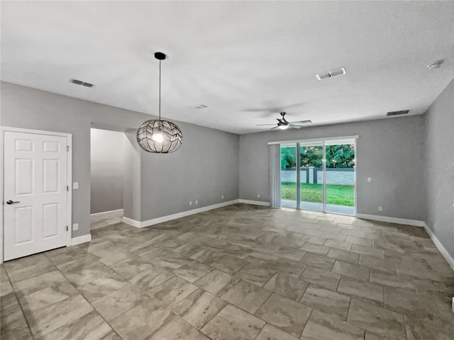 empty room featuring ceiling fan