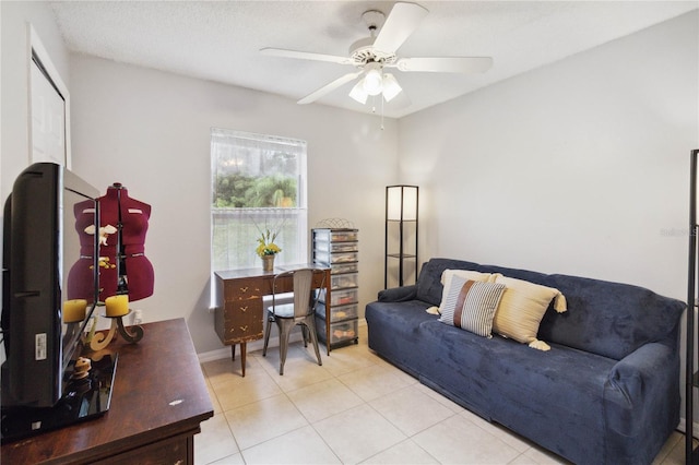 tiled living room featuring ceiling fan