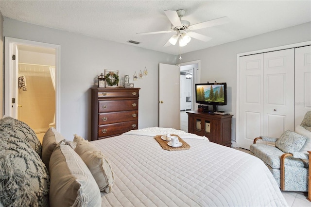 bedroom featuring a textured ceiling and ceiling fan